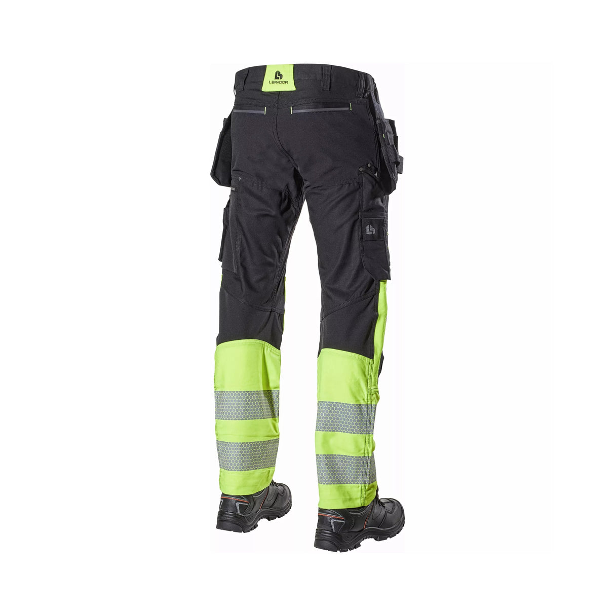 Hi-Vis håndverksbukse med FlexiComb™-reflekser, spikerlommer og praktiske verktøylommer.
