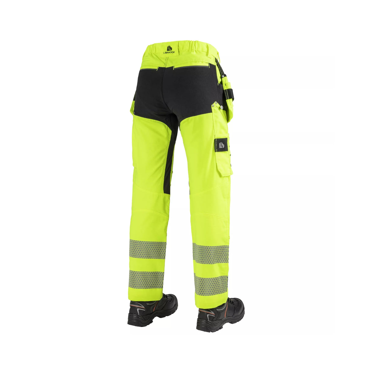 HiVis arbeidsbukse til dame med spikerlommer, FlexiComb™-reflekser og praktiske verktøylommer.