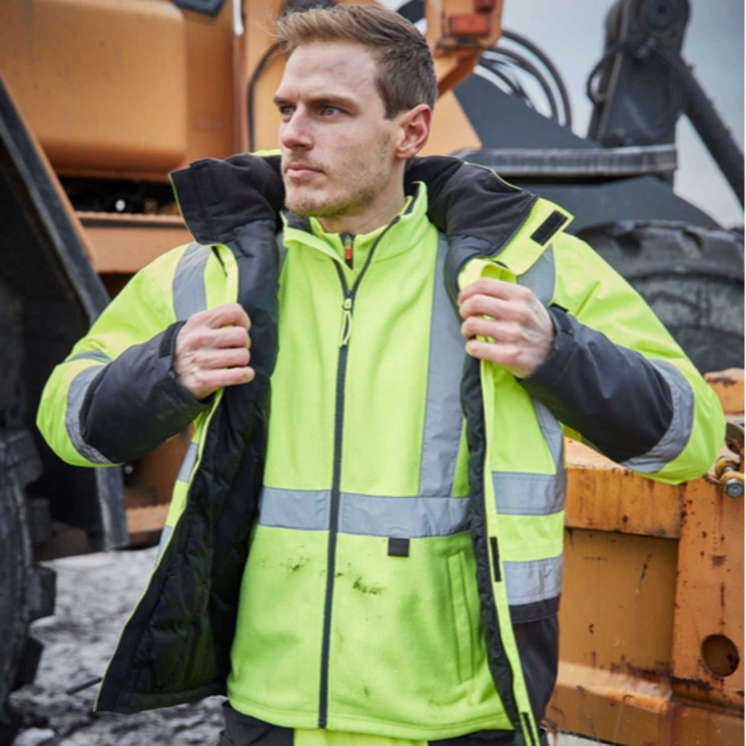 Komfortabel arbeidsfleece med høy krage og YKK-glidelås.